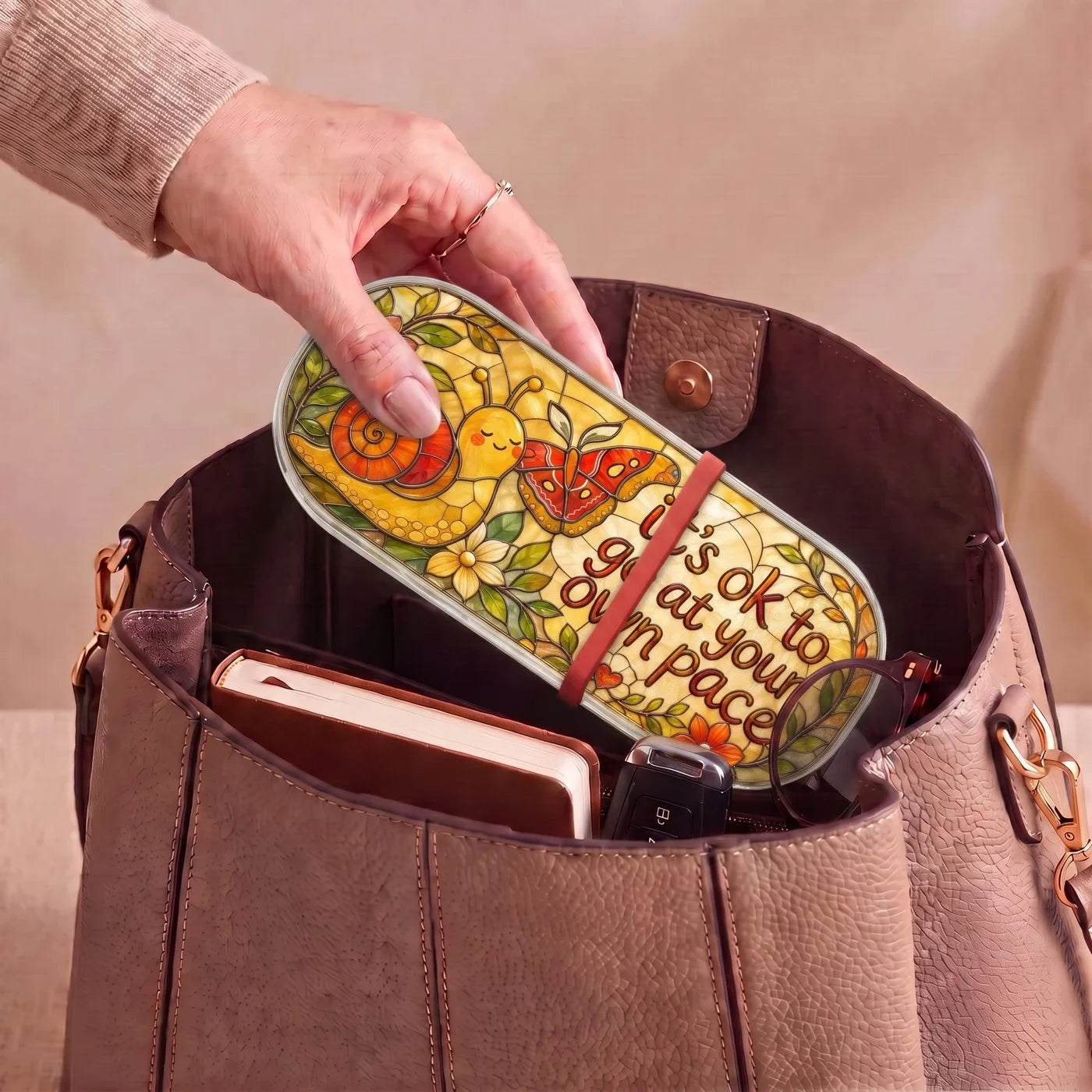 "It’s OK to Go at Your Own Pace — Snail & Butterfly Stained Glass" Pill Case — snail and butterfly Pill Case carried inside a handbag