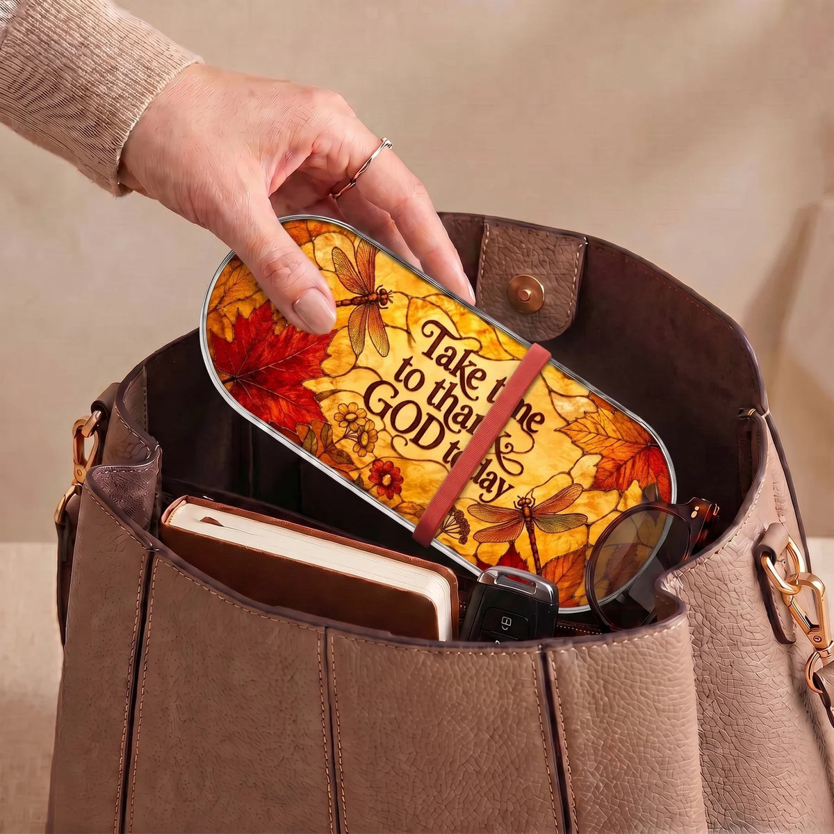 Autumn dragonfly gratitude Pillcase carried inside a handbag with everyday essentials