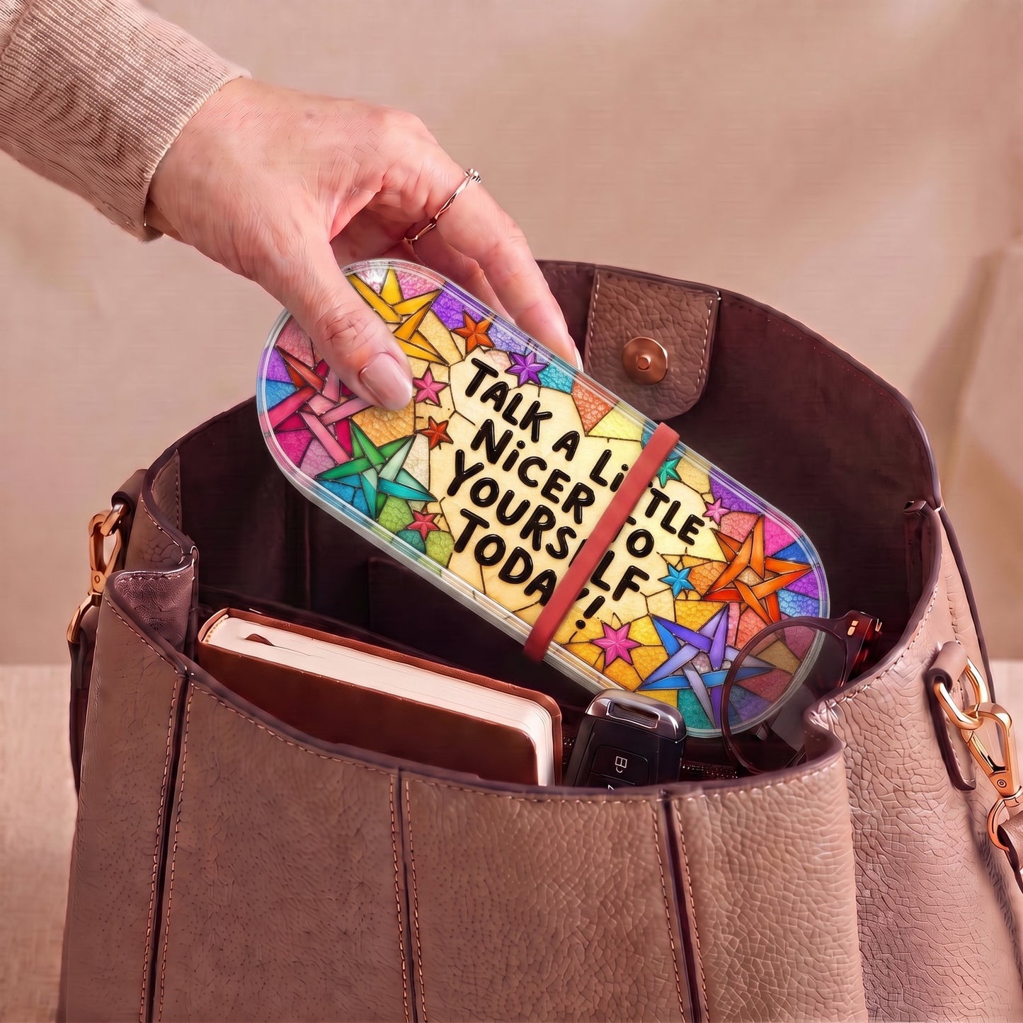 Talk a Little Nicer to Yourself Today colorful-star Pillcase carried inside a handbag with everyday essentials