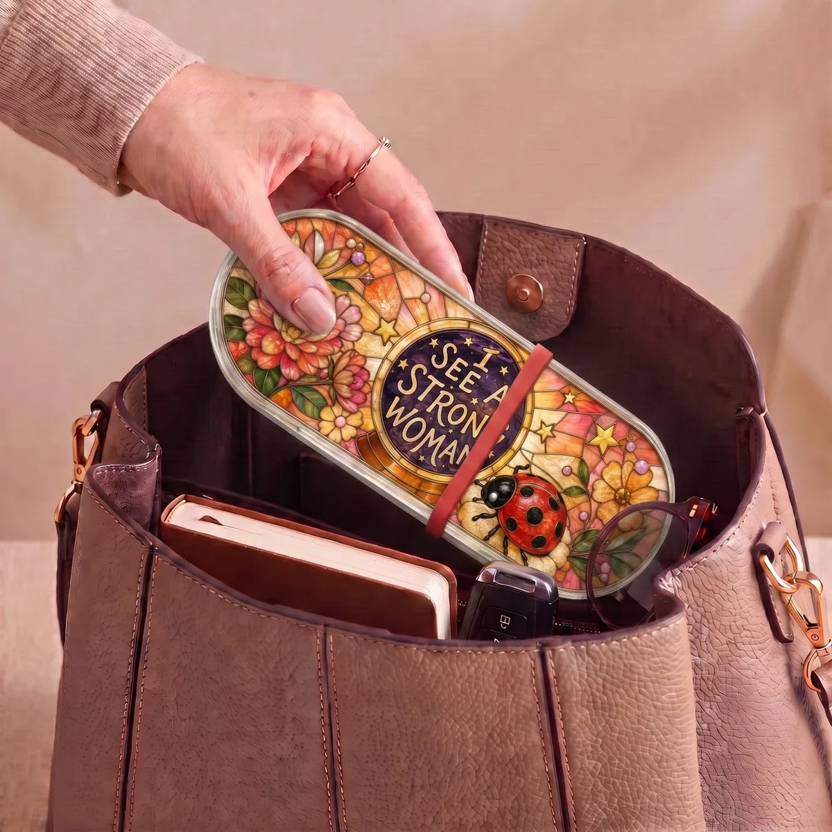 "I See a Strong Woman — Ladybug & Floral Stained Glass" Pill Case — I See a Strong Woman ladybug Pill Case carried inside a handbag