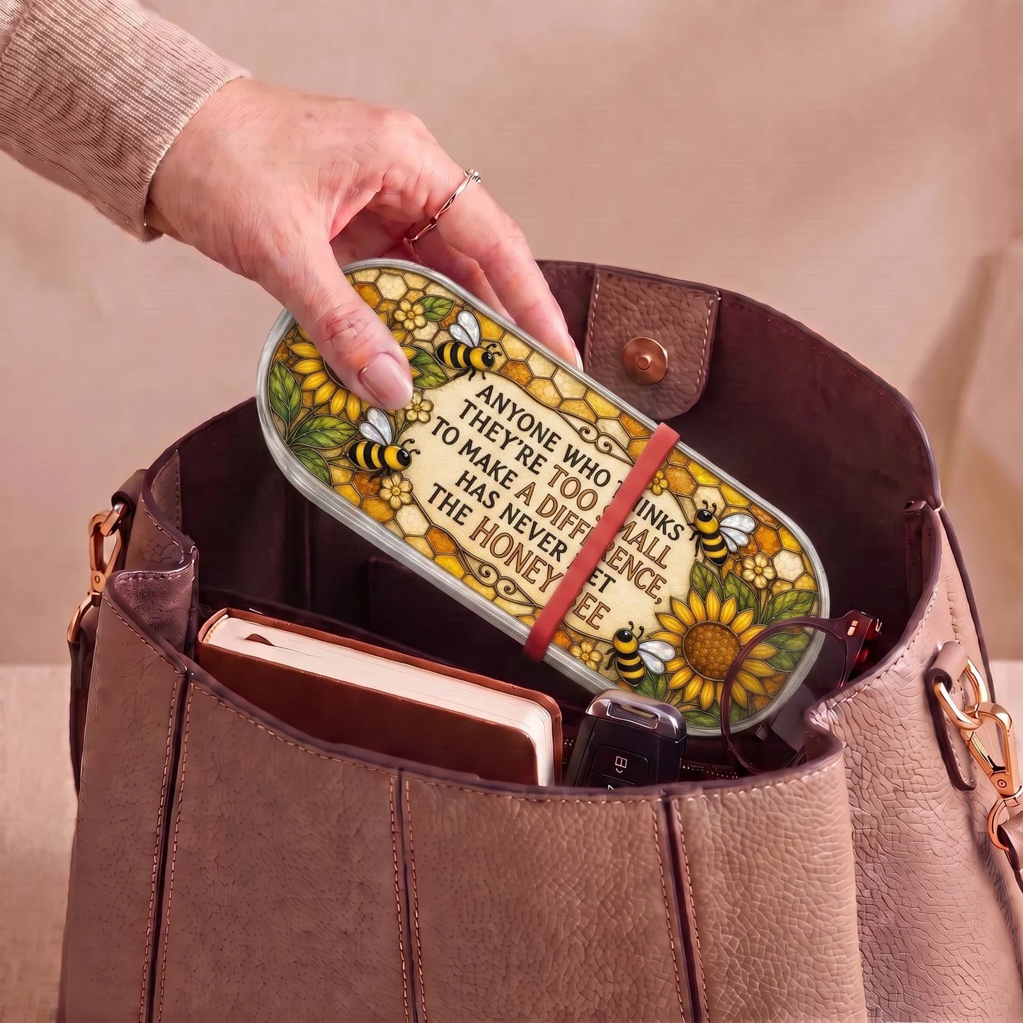 Honey bee sunflower Pillcase carried inside a handbag with everyday essentials