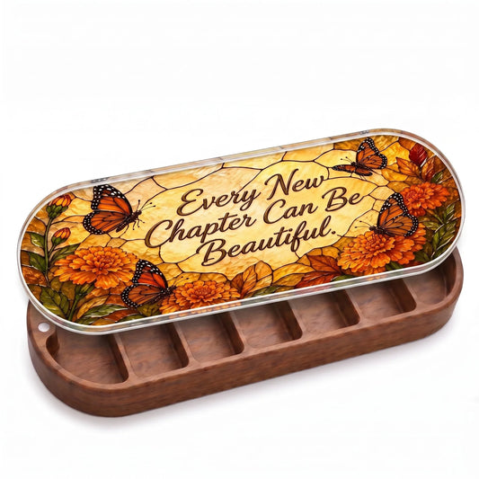 Open wooden Every New Chapter Can Be Beautiful Pillcase with an autumn butterfly garden on a stained-glass-style lid on white