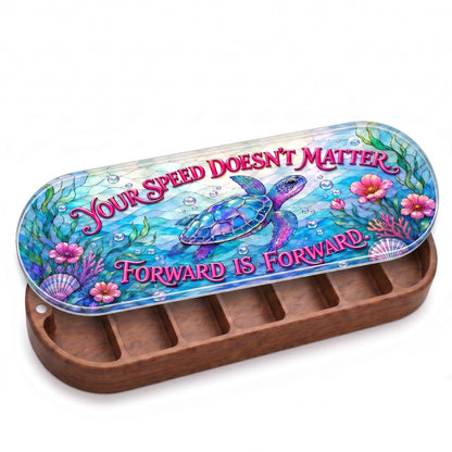 Open wooden Pillcase with sea turtle artwork and Forward Is Forward message on white