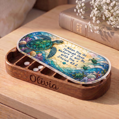 Personalized wooden Pillcase with Isaiah 43:2 sea turtle artwork on bedside table
