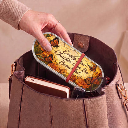 Every New Chapter Can Be Beautiful autumn-butterfly Pillcase carried inside a handbag with everyday essentials