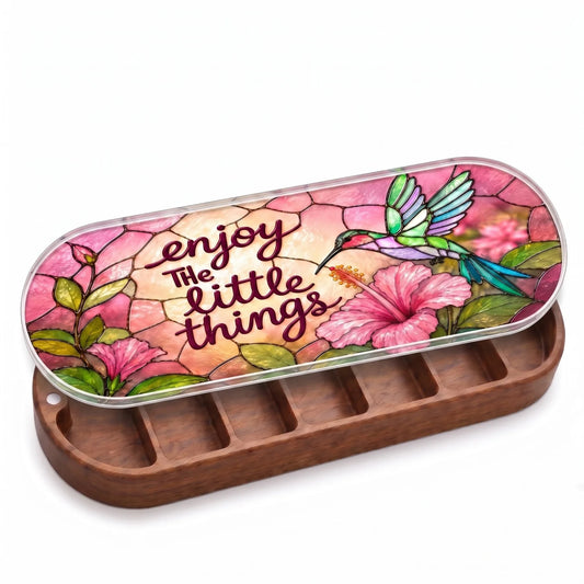 Open wooden Enjoy the Little Things Pillcase with hummingbird and pink hibiscus stained-glass-style lid on white