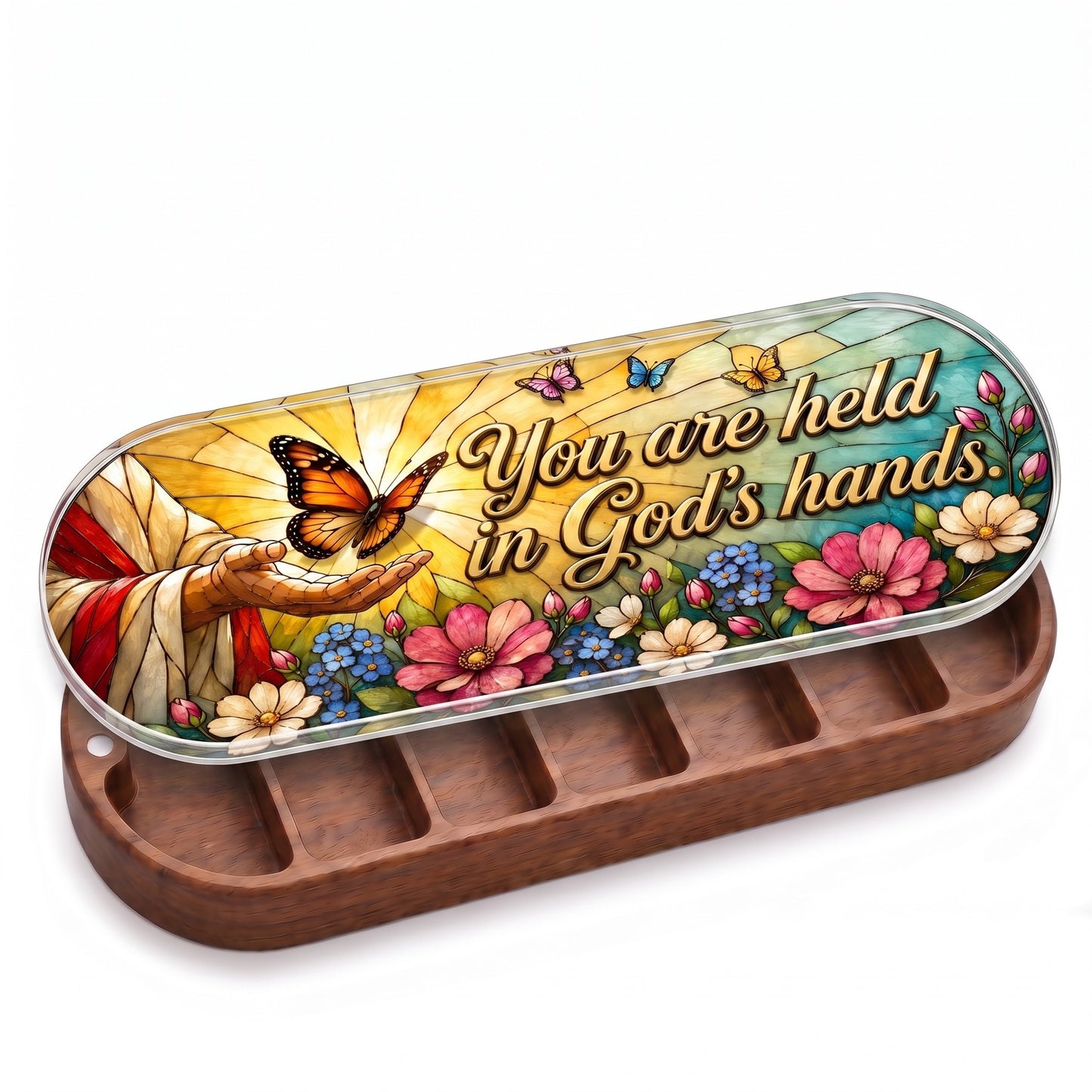 Open wooden Pillcase with outstretched hand, monarch butterfly and floral stained-glass lid on white