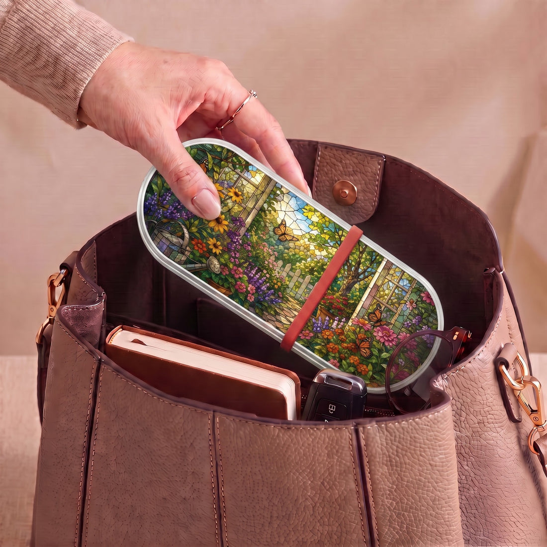 Garden Path in Bloom floral Pillcase carried inside a handbag with everyday essentials