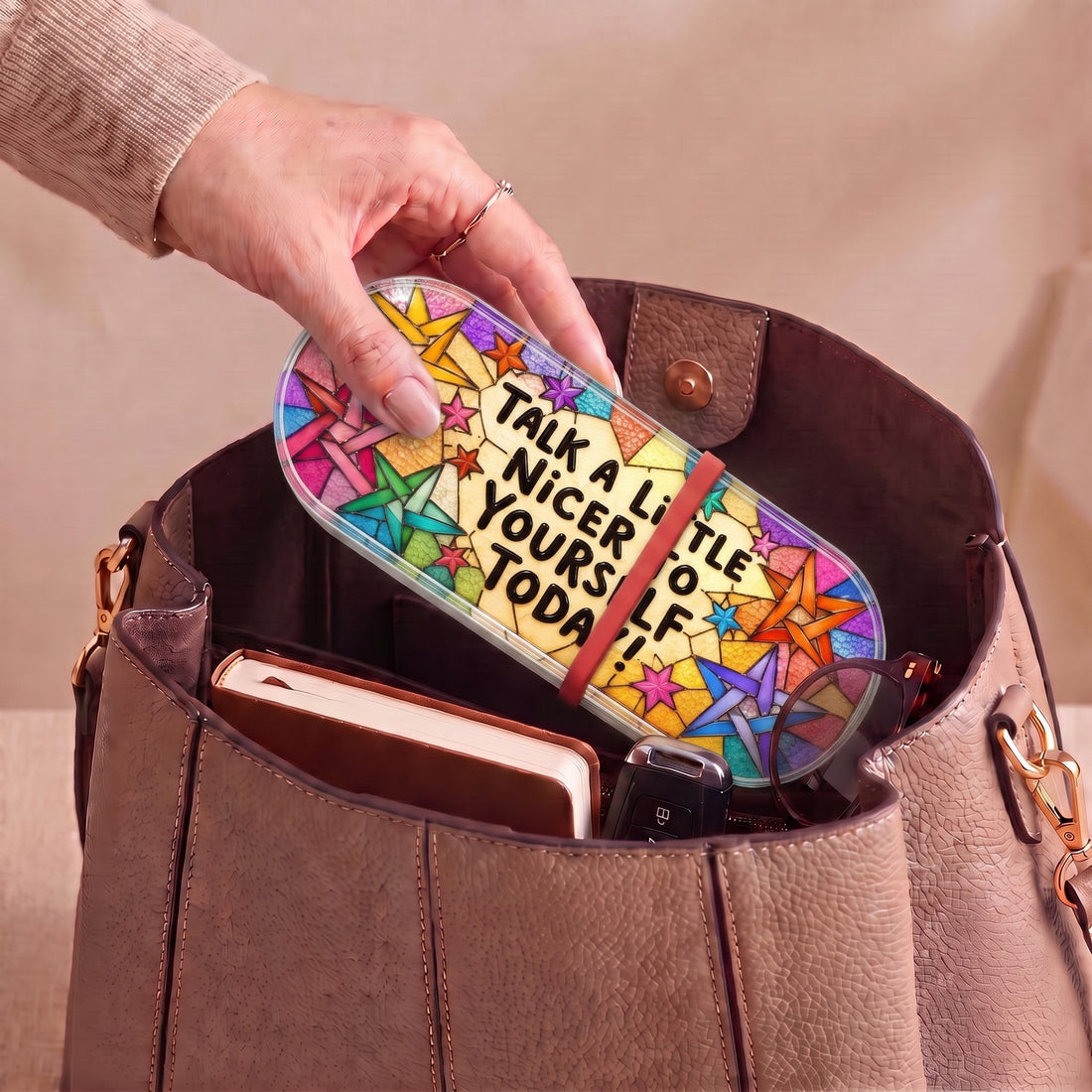 Talk a Little Nicer to Yourself Today colorful-star Pillcase carried inside a handbag with everyday essentials