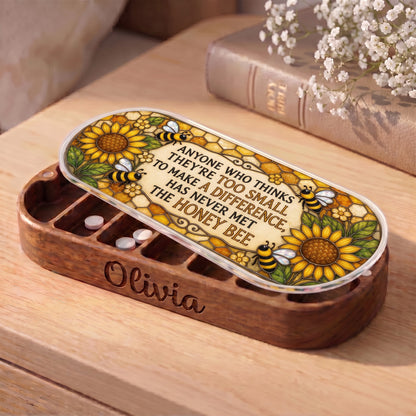 Personalized wooden Pillcase with honey bee quote lid and white tablets on bedside table