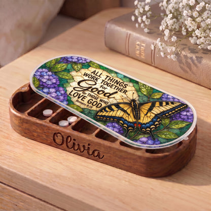 Personalized wooden Pillcase with Romans 8:28 swallowtail butterfly artwork on bedside table