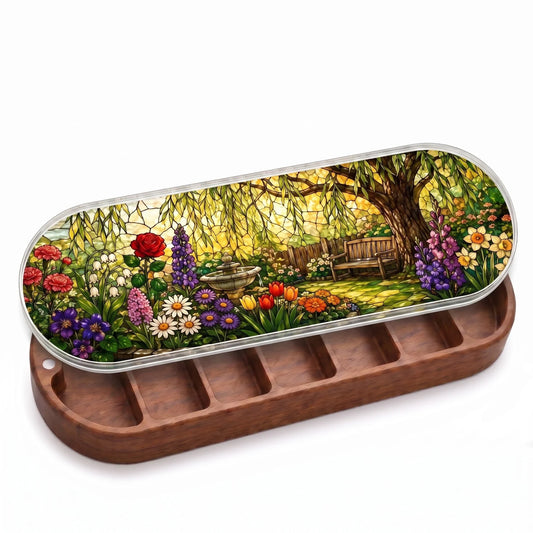 Open wooden Peaceful Garden Retreat Pillcase with stained-glass-style garden lid on white