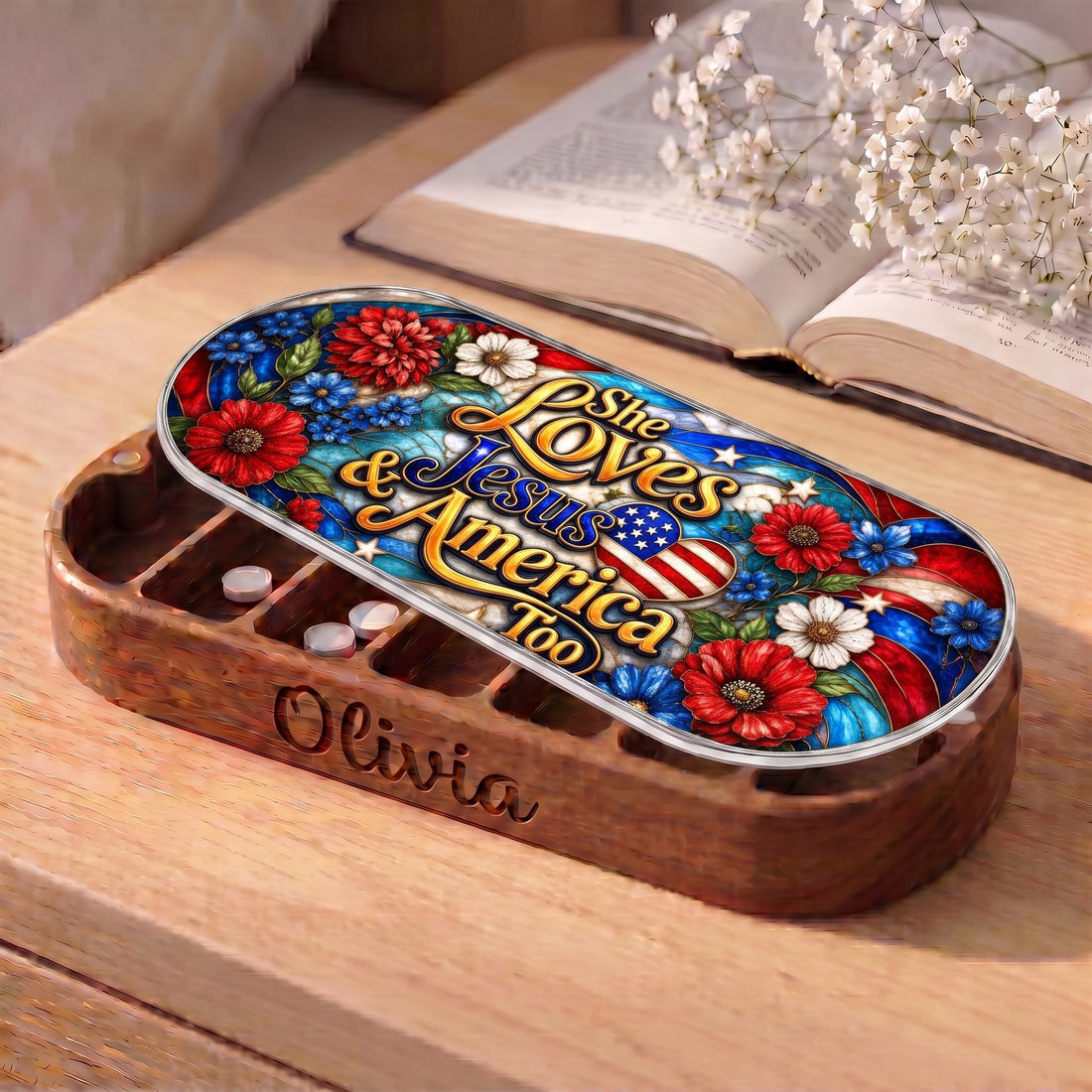Personalized Olivia Pillcase with patriotic floral Jesus and America lid beside an open book