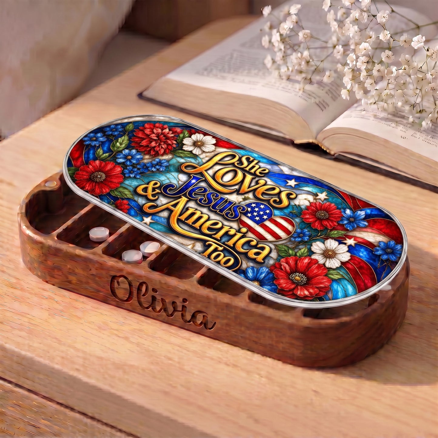 Personalized Olivia Pillcase with patriotic floral Jesus and America lid beside an open book