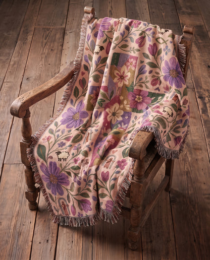 Meadow Cross of Faith - Shepherds Garden Woven Blanket - Meadow Cross of Faith woven blanket draped on rustic rocking chair