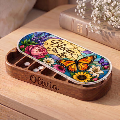 Personalized wooden Pillcase with Bloom in His Love monarch butterfly artwork on bedside table