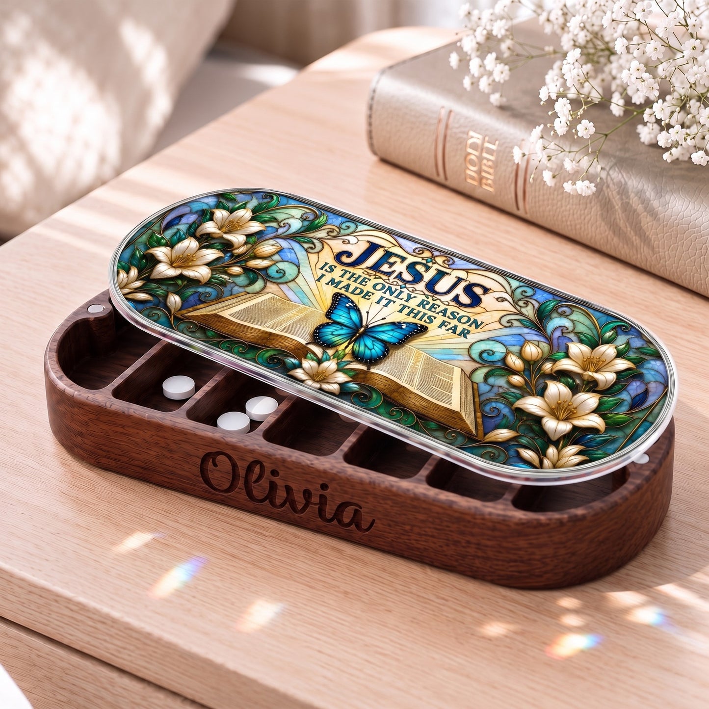 Personalized Olivia Pillcase with Jesus Is the Only Reason artwork, white lilies and blue butterfly beside a Holy Bible